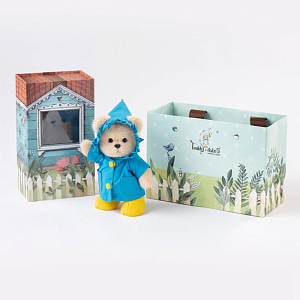 Медведь Lina TeddyTales, в синем дождевике, молочный, брелок, XS, 15 см